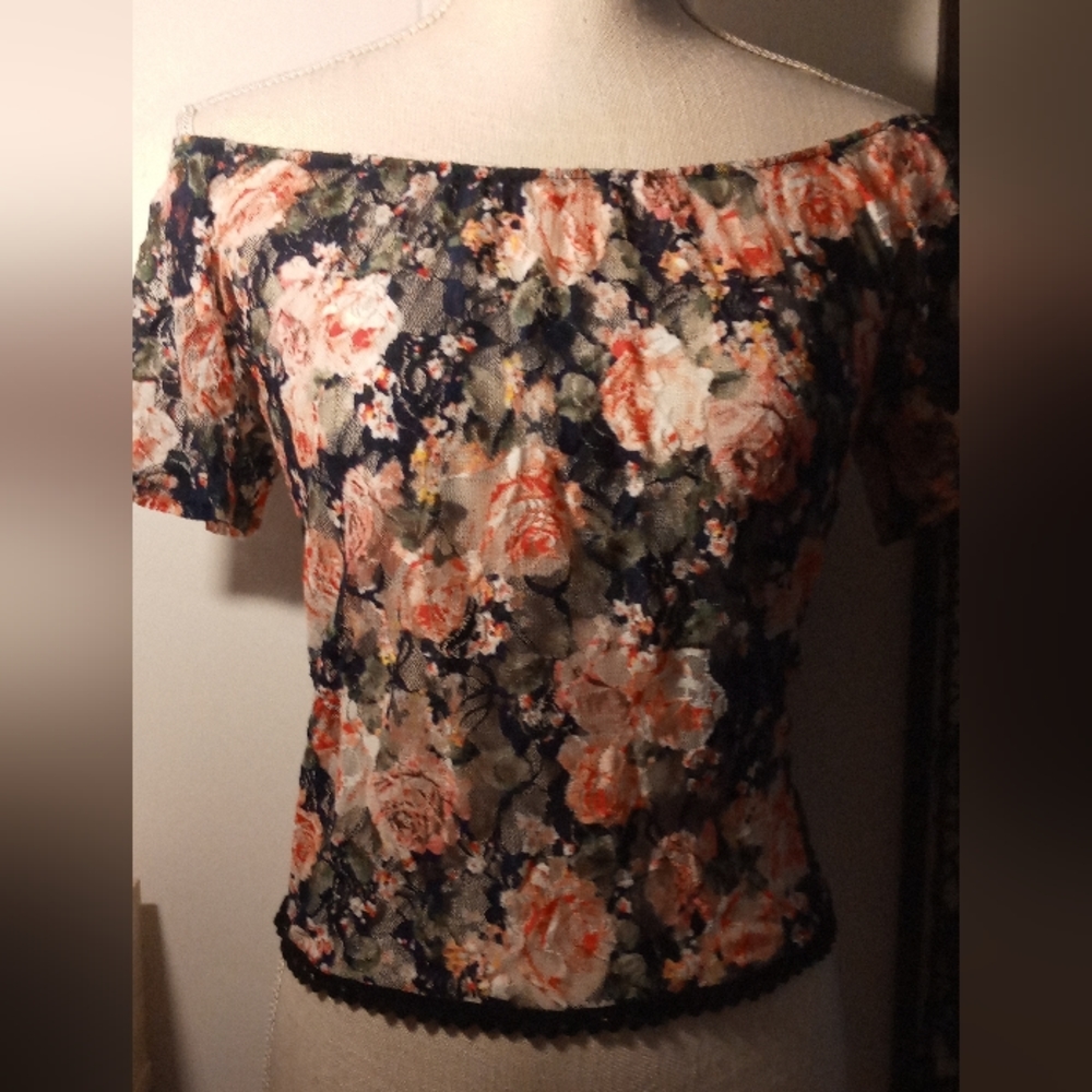 i. on Floral Top
